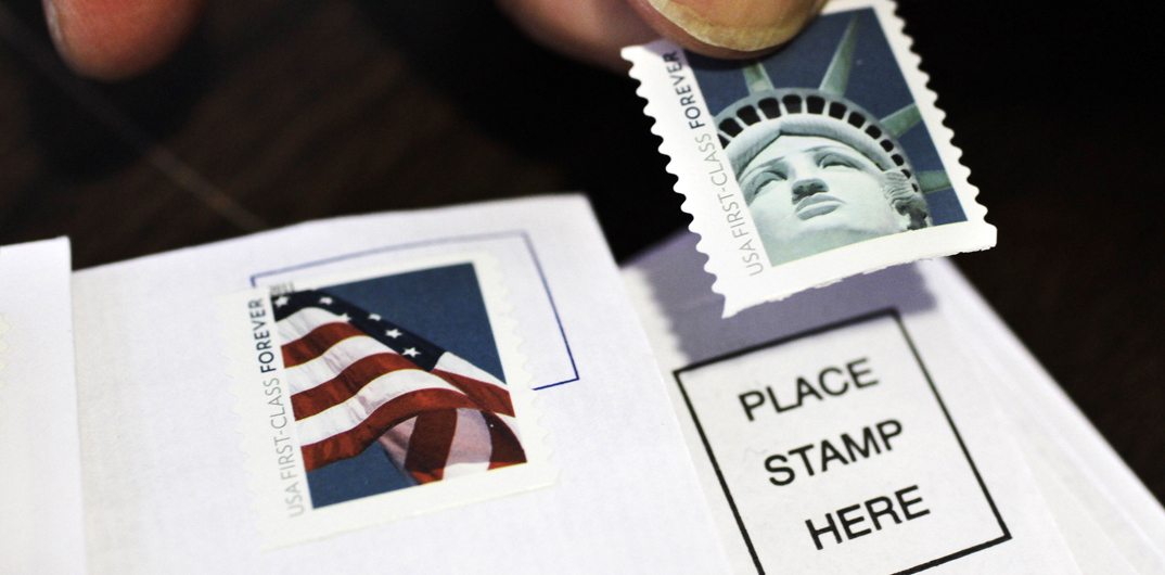 postage-stamp-cost-goes-down