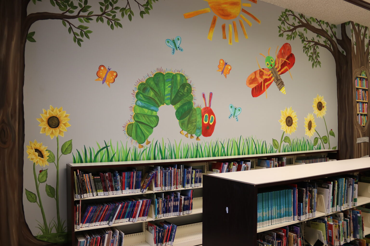 Murals transform Minden library Children’s Room into storybook ...